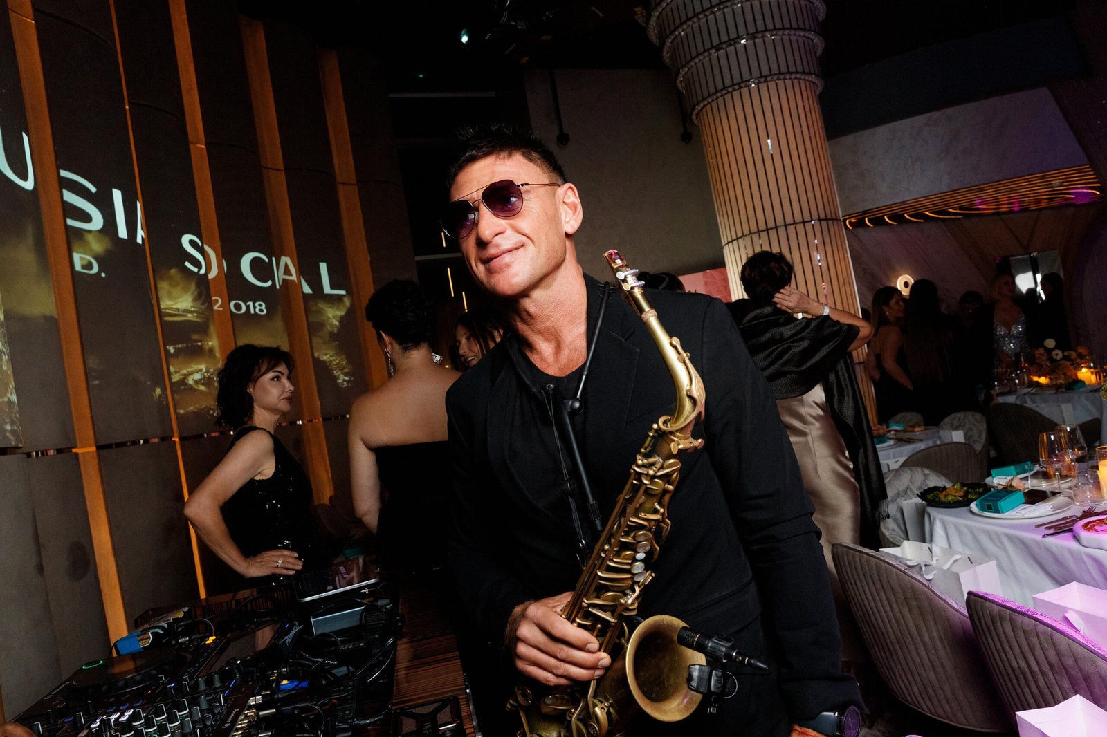 Saxophonist performing live at a Showciety event